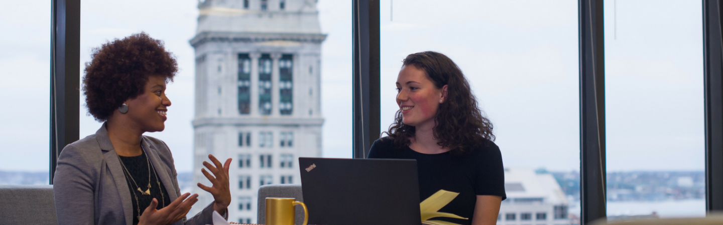 UNH students meeting in an office building