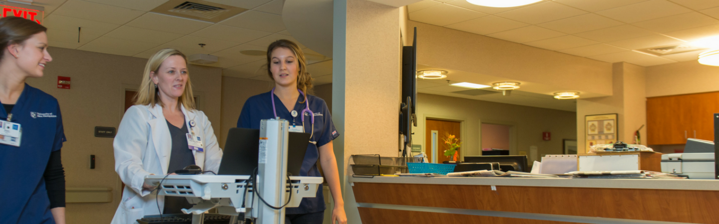 Nursing students working in a hospital setting