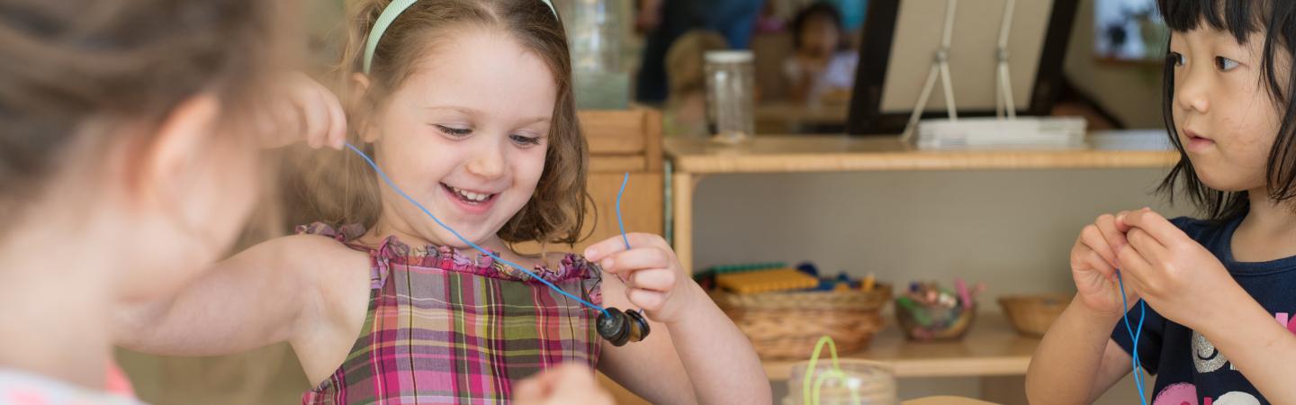 child playing with string