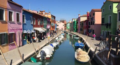 chhs study abroad colorful homes along canal in italy