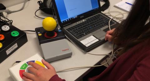 Students in the Assistive Technology (Graduate Certificate) program at UNH using assistive technology at their computer