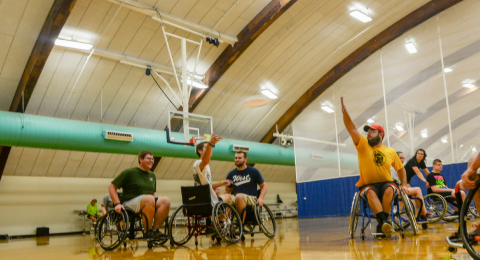 UNH Recreation Management and Policy Major Therapeutic Recreation Option students partake in a sporting event with members of Northeast Passage