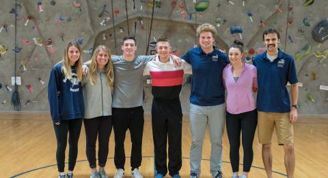 UNH Physical Education students in the climbing wall gym in NH Hall